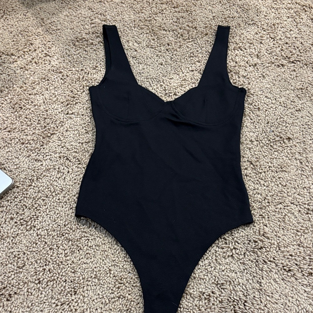 Black womans body suit